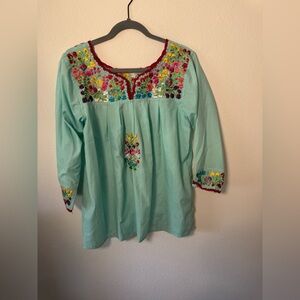 Hand Embroidered turquoise blouse handmade in Oaxaca Mexico